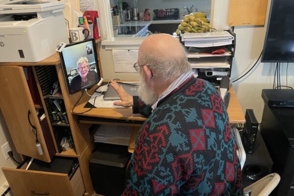 Billy video conferencing with Nancy